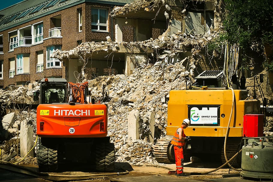 man, wearing, white, hard, hat, yellow, orange, tractors, site, demolition