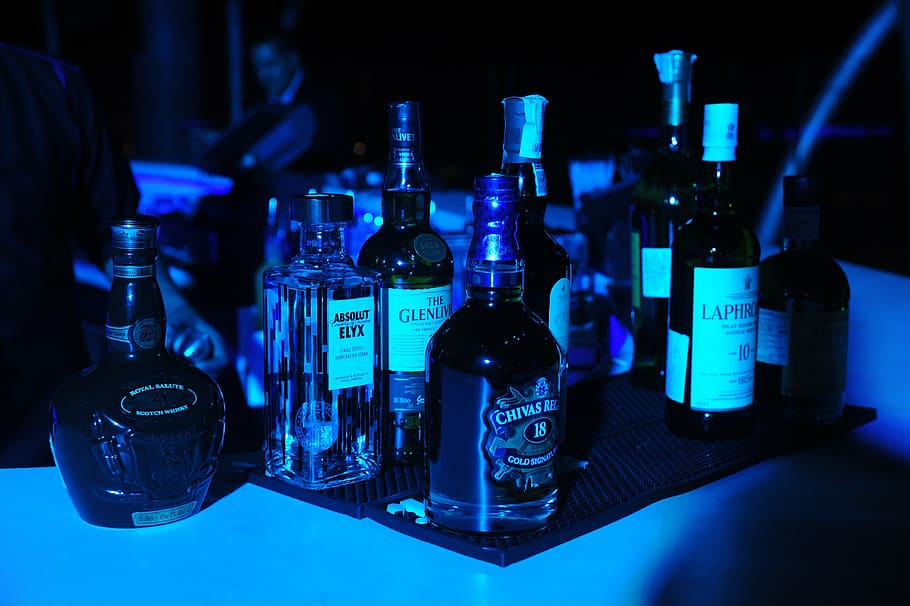 assorted liquor bottles, alcohol, party, whiskey, bar, beverage, cocktail, night, celebration, restaurant