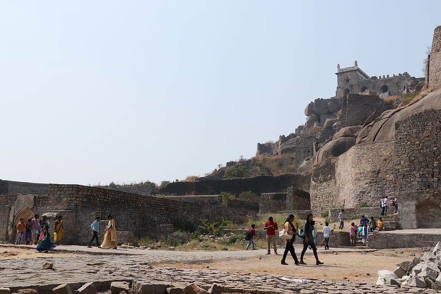 golconda fort, architecture, hyderabad, india, group of people, history, sky, the past, real people, ancient