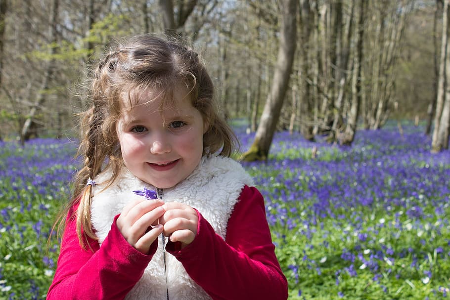 smiling, girl, standing, forest, purple, flower field, bluebells, woods, english, spring
