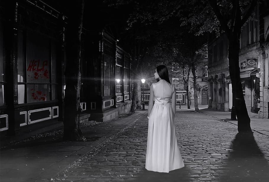 woman, wearing, white, sleeveless dress, brunette, scary, road, fear, night, black and white