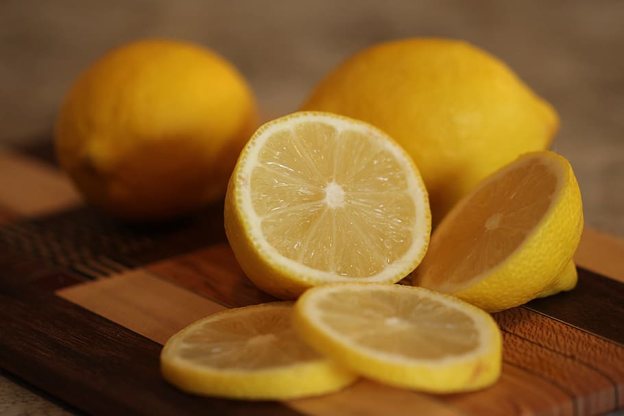 sliced lemons, citrus, fruit, fruit juice, raw, food, healthy, natural, green, vegetarian
