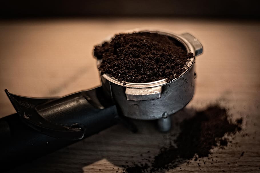 espresso, coffee, grinds, espresso maker, cafe, indoors, food and drink, close-up, ground coffee, focus on foreground