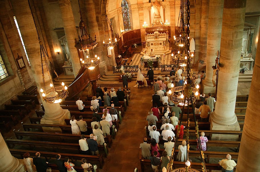 wedding ceremony, inside, cathedral, architecture, candles, chandeliers, church, group, people, pillars