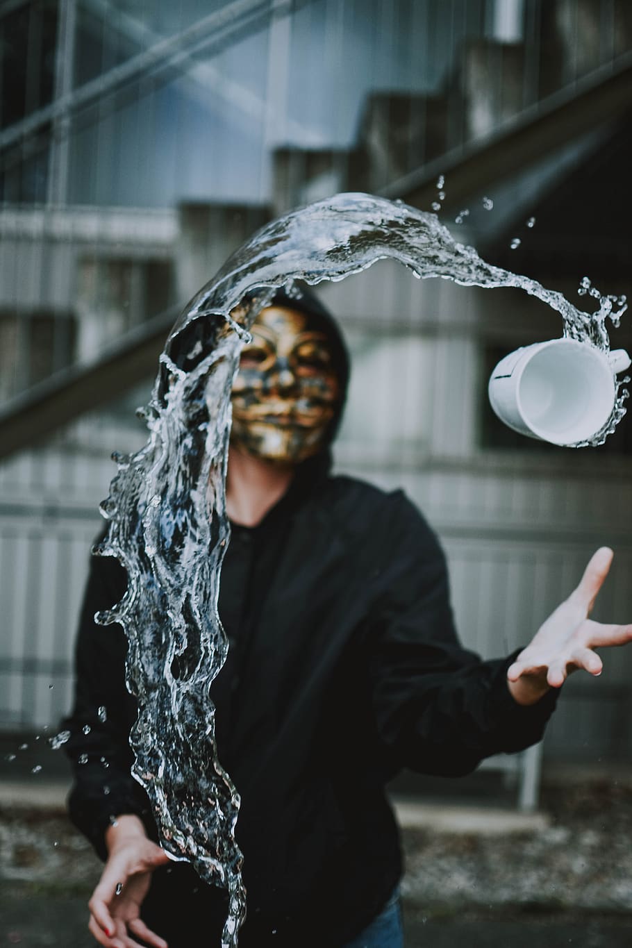 moment, water, throw, cup, mask, real people, architecture, motion, built structure, one person