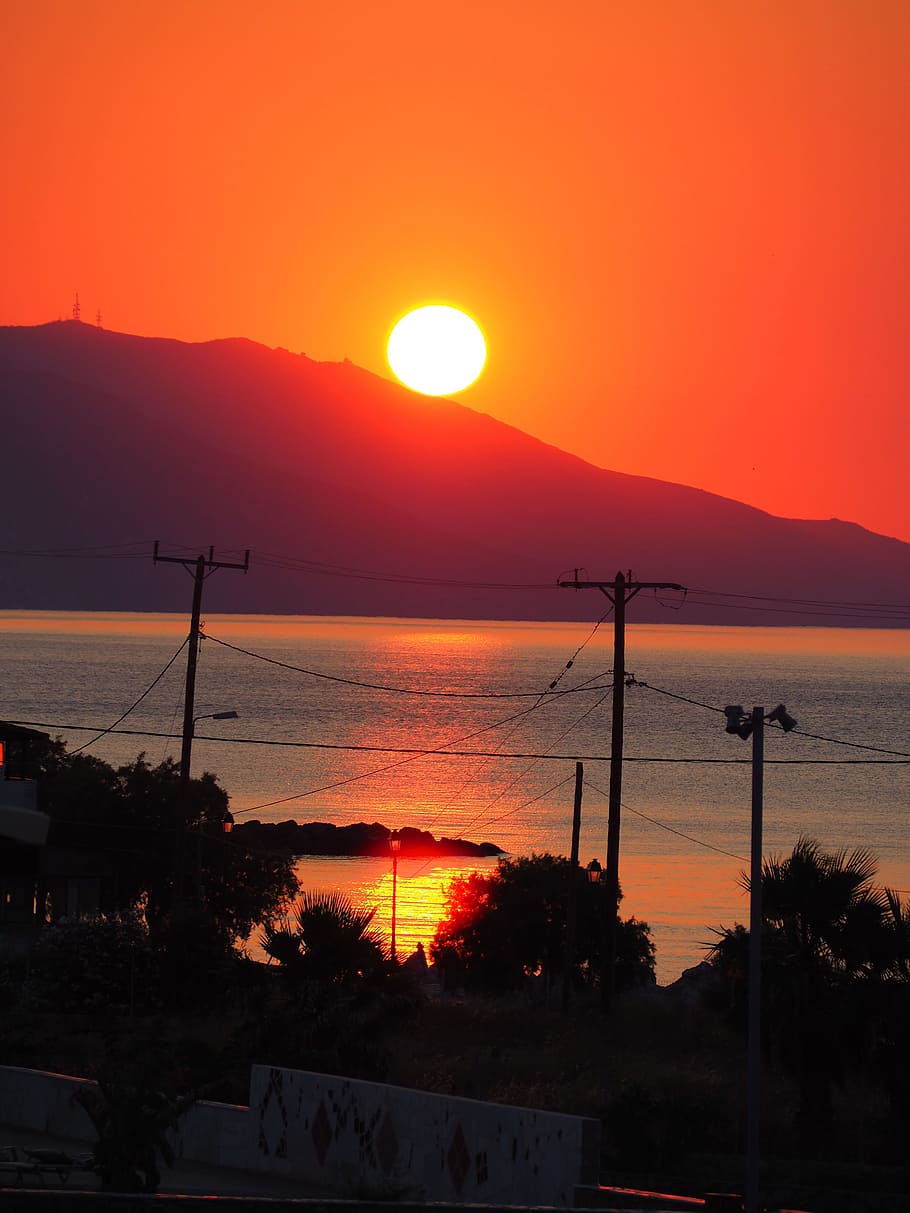 Puesta de sol, Kos, Grecia, Vacaciones, Sol, color naranja, sin gente, silueta, torre de electricidad, cielo