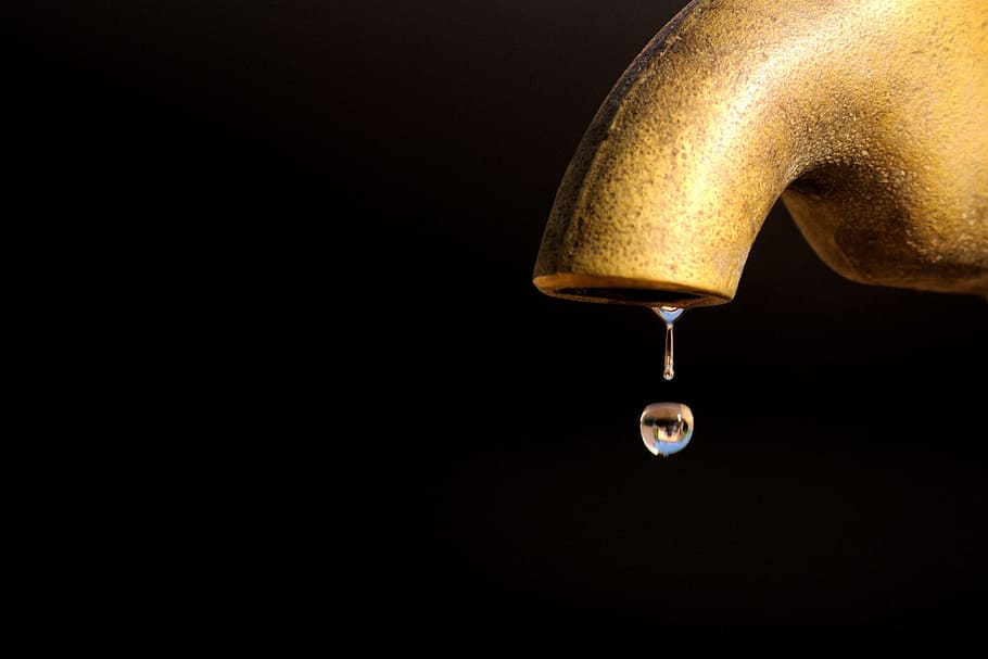 tap, dripping, drop, indoors, studio shot, water, copy space, close-up, black background, motion