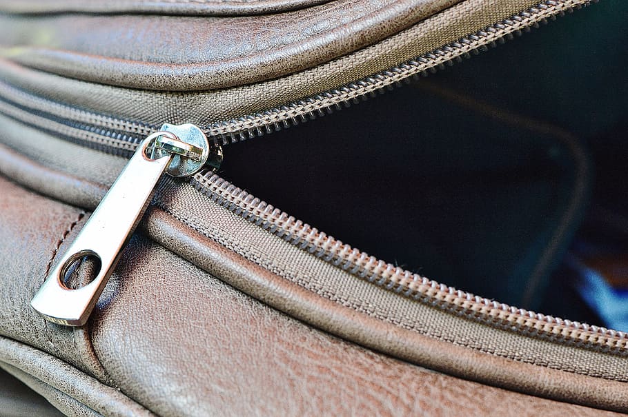 close-up photo, half, open, brown, leather bag, zip, grey, bag, zipper, clothing