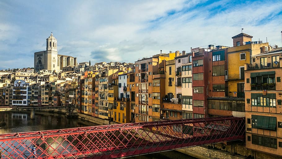 aerial, photography, red, metal bridge, surrounded, buildings, daytime, girona, catalonia, catalunya