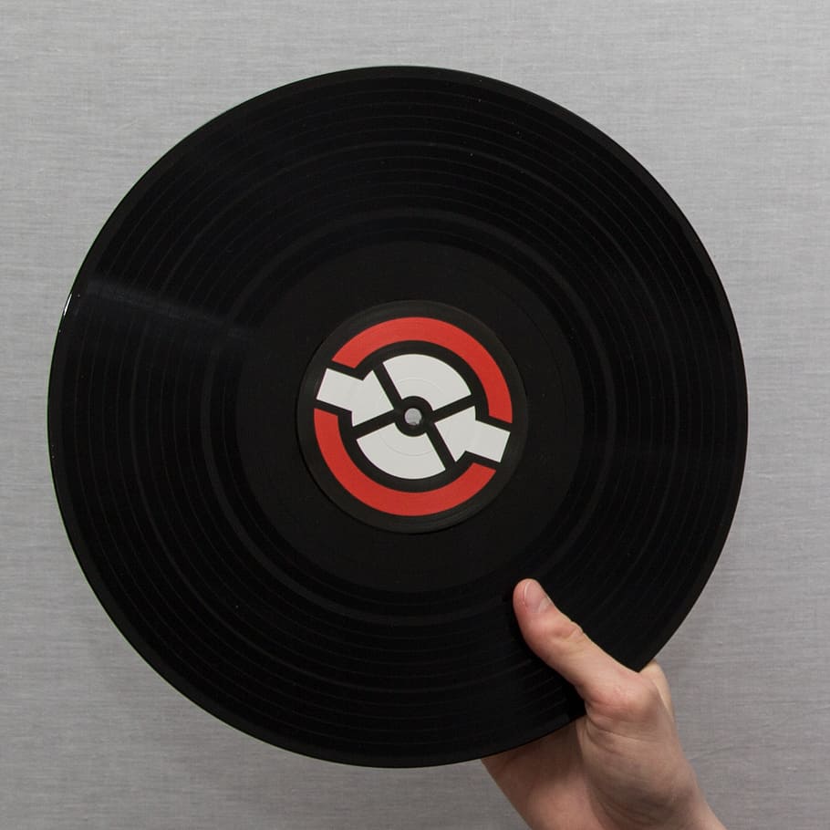 person, holding, vinyl record disc, lp, dj, music, human hand, hand, human body part, circle
