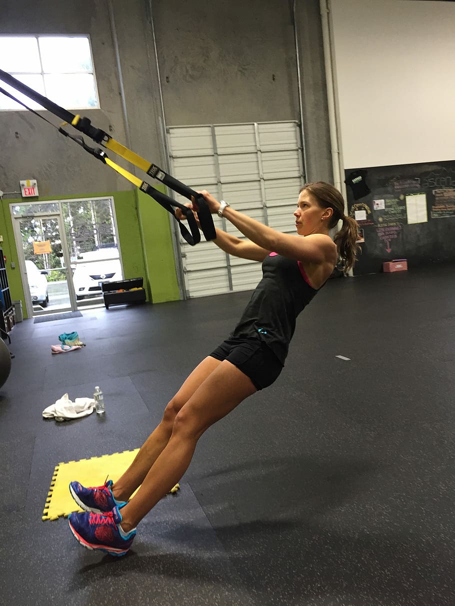 woman, exercising, using, resistance band, Trx, Row, Workout, Fitness, Strength, back