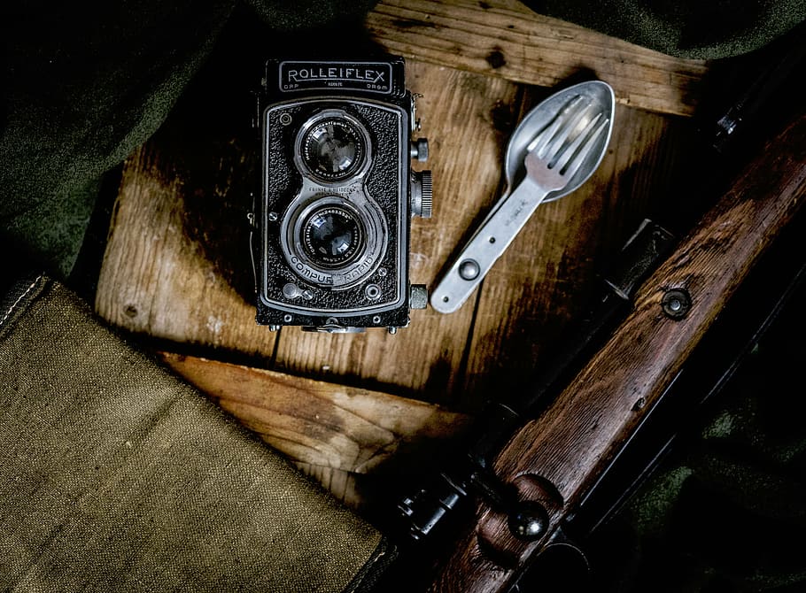 black, rolleflex point-and-shoot camera, brown, wood plank, camera, rolleiflex, utility, spoon, fork, wood