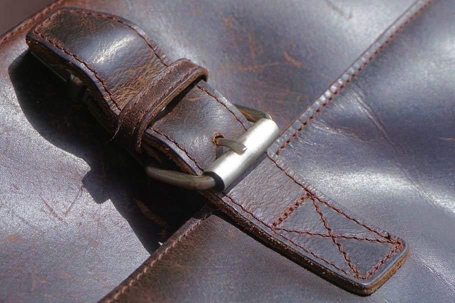 brown leather strap, bag, leather, leather case, briefcase, closure, close, indoors, still life, close-up