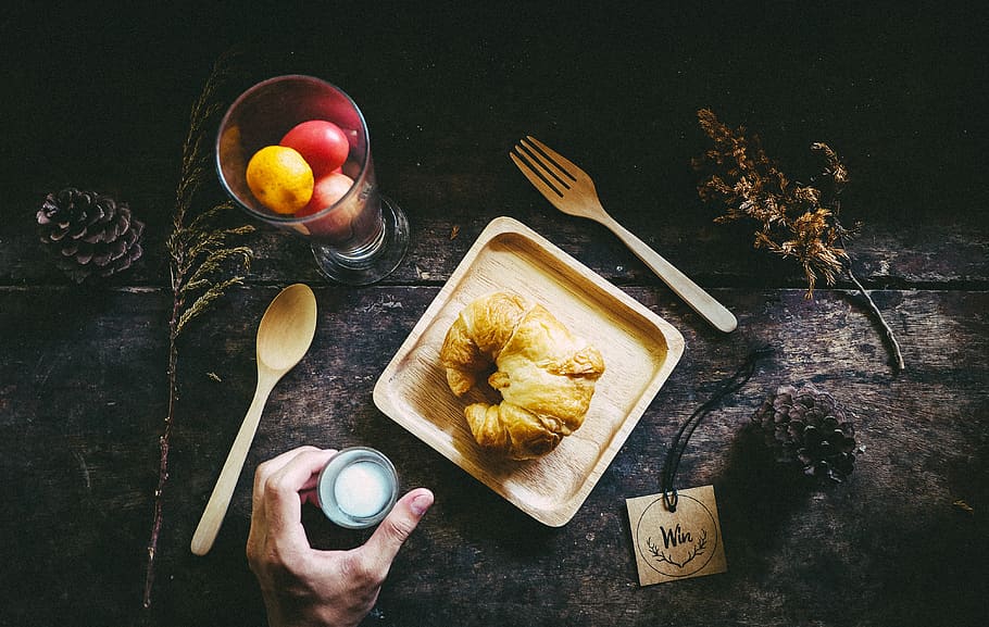 croissant, bread, display, table, glass, fruit, food, tag, hand, wooden