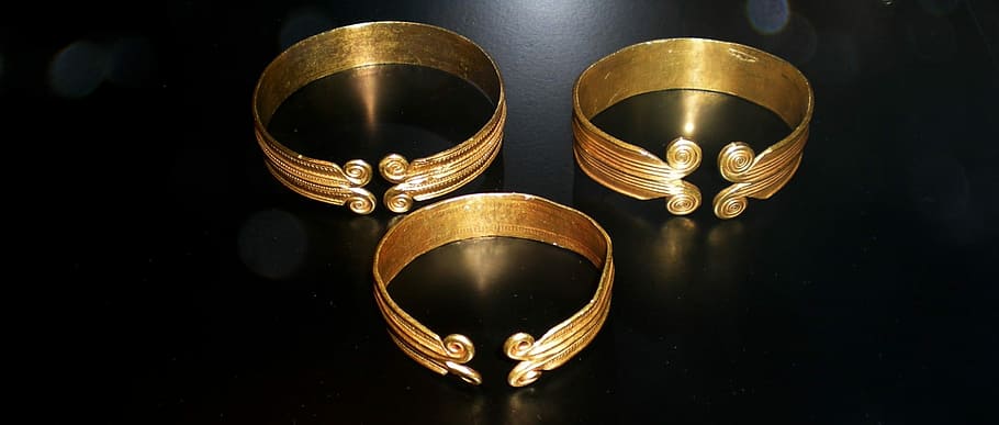 three, gold-colored cuff bracelets, Viking, Stone Age, Bronze, Gold, golden, scandinavian, historical, museum