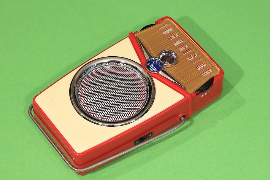 transistor, radio, receiver, portable, pocket, beach boy, retro, colored background, green color, studio shot