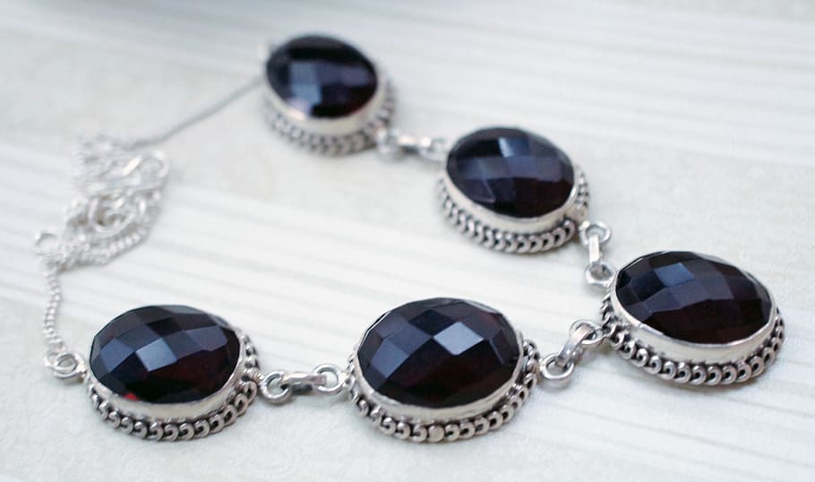 silver-colored, black, gemstone, studded, necklace, beige, surface, garnet, quartz, crystal