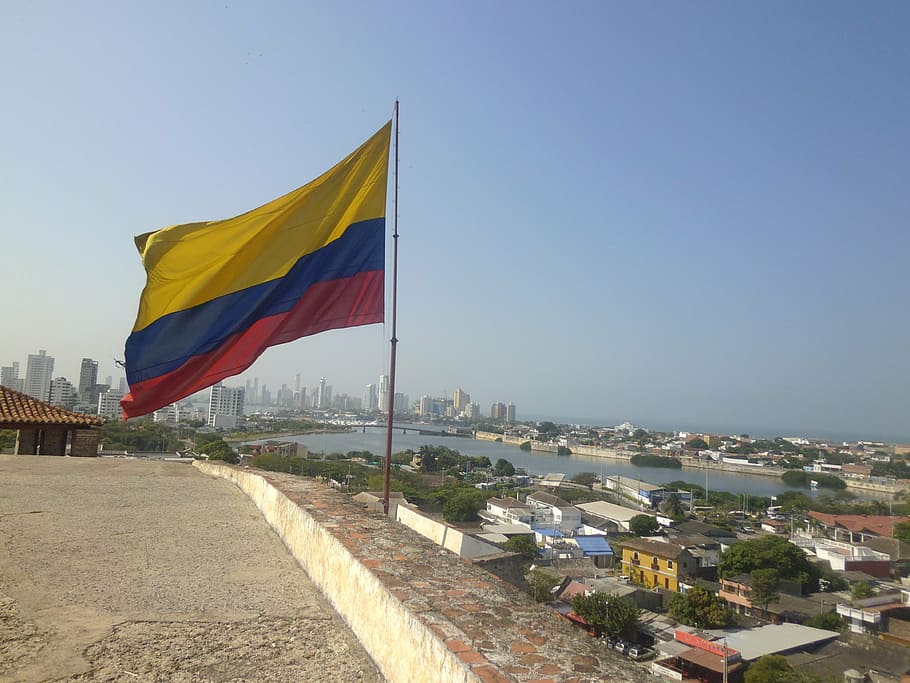 country flag, colombia, flag, sky, architecture, built structure, patriotism, building exterior, nature, city