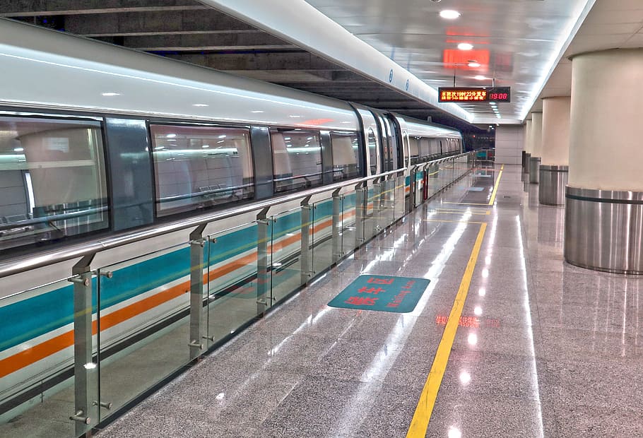white, teal, orange, train, train station, transrapid, station, shanghai, stop, magnetic levitation
