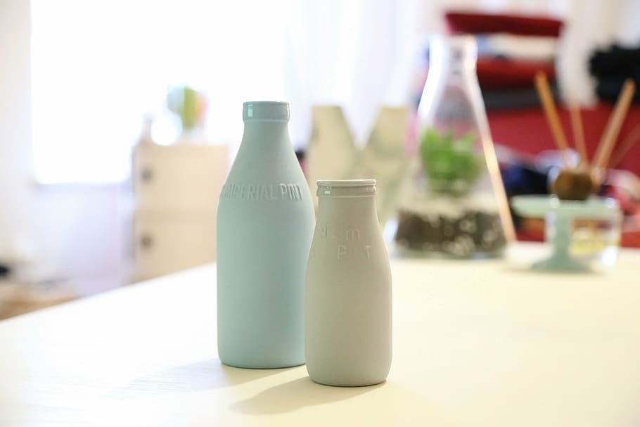 two, gray, white, glass bottles, wooden, table, bottle, milk, drink, beverage