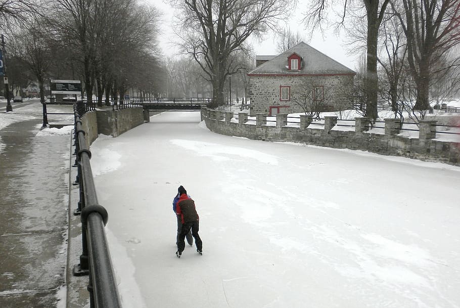 lachine canal, canada, couple, skating, frozen, water, buildings, winter, snow, ice