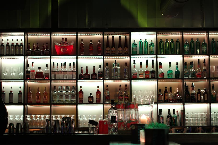 bar, alcohol, wall, gastronomy, bottles, choice, arrangement, shelf, container, large group of objects