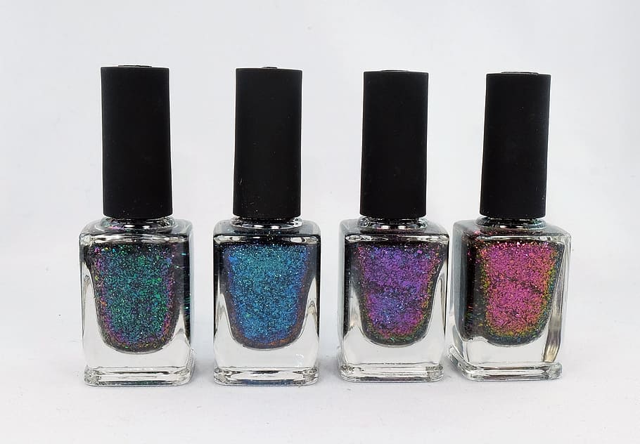 four, assorted-color glitter nail polishes, nail varnish, cosmetics, beauty Product, fashion, glamour, manicure, personal Accessory, make-up