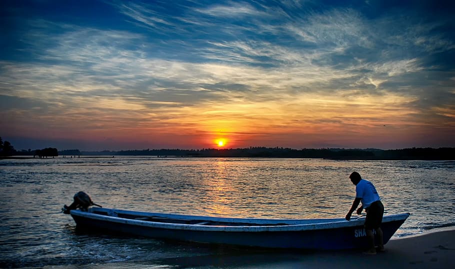 body of water, sunset, canoe, dawn, boat, water, sky, nautical vessel, transportation, cloud - sky