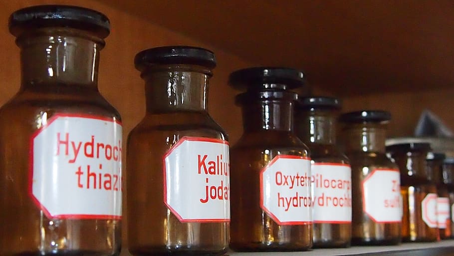 bottle, pharmacy, pharma, vessels, container, text, label, indoors, western script, close-up