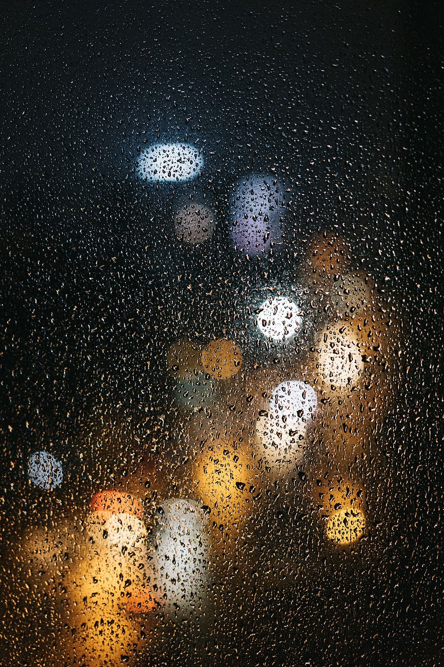 white, yellow, bokeh lights, rain, glass, it's raining, night, water droplets, city corner, with the beat