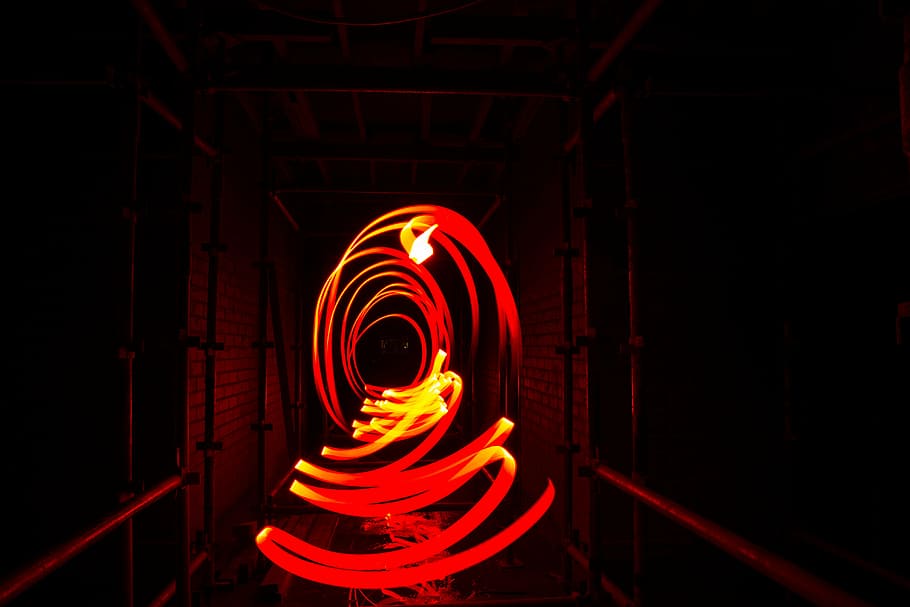 steel wool photography, red, light, inside, tunnel, time, laps, passing, brown, wooden