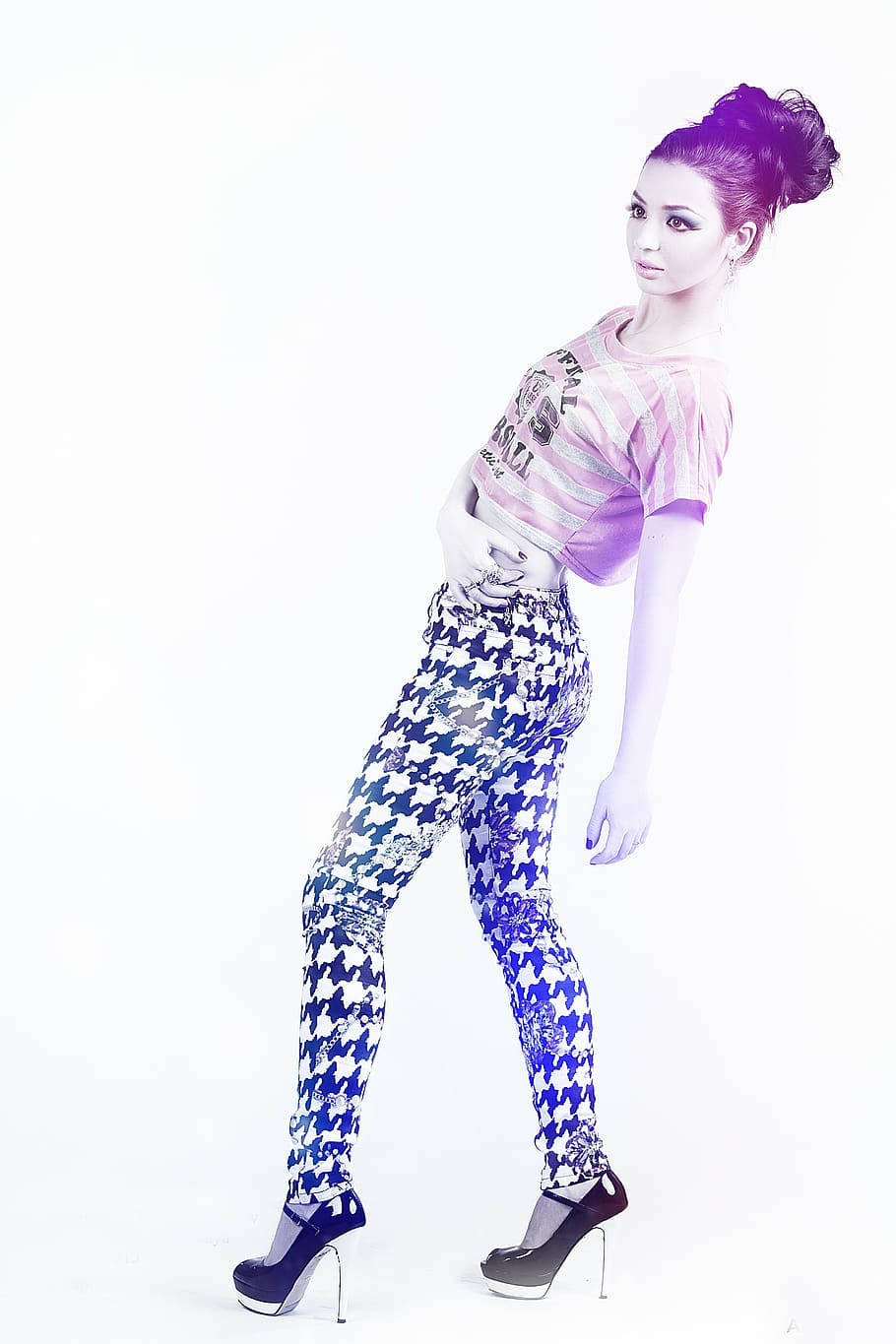 woman, wearing, pink, gray, striped, crop, top, black, white, houndstooth pants