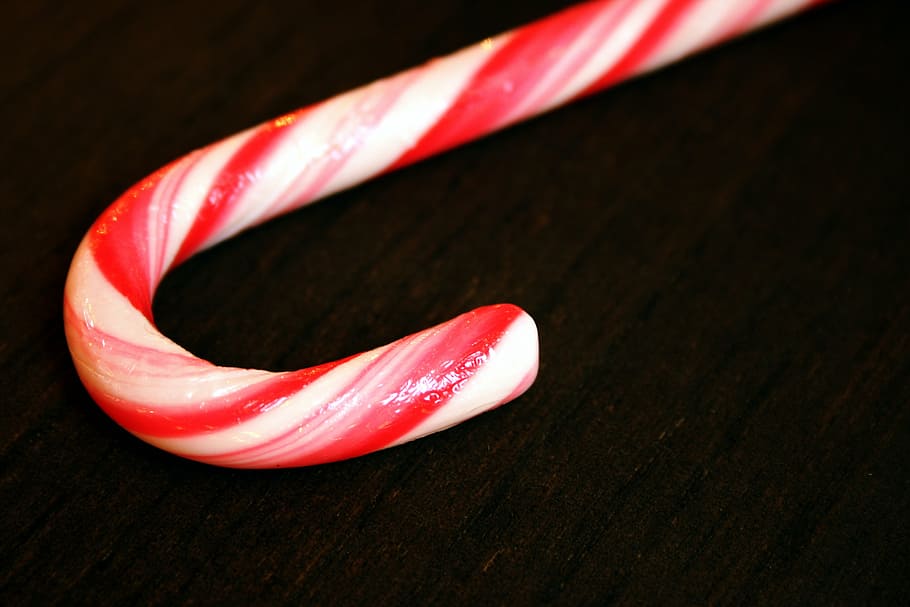 red, white, candy cane, food, sweet, sugar, sweetness, close-up, indoors, black background