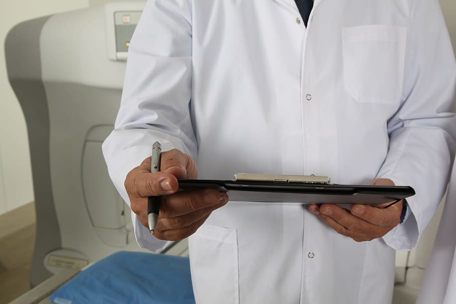 man, wearing, white, coat, holding, black, clipboard, pen, doctor, tomograph