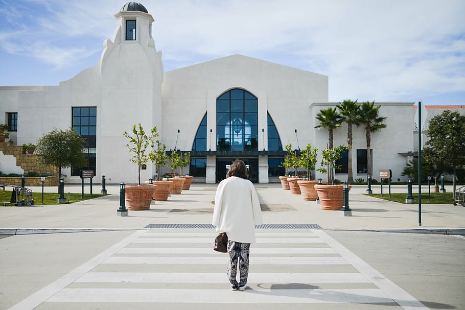 woman, walking, pedestrian, white, jacket, grey, top, road, daytime, Santa Barbara