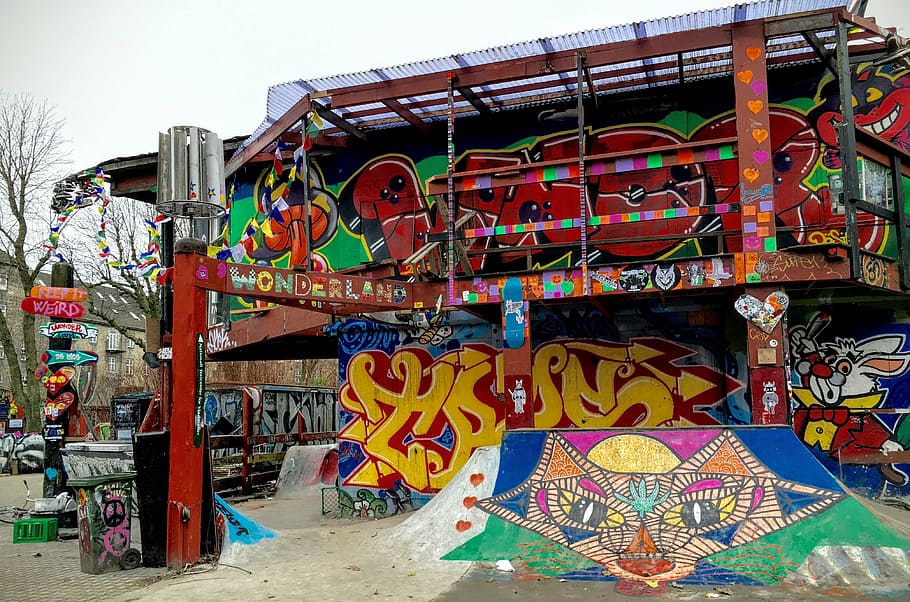 graffiti, red, metal building, daytime, green, blue, art, mural, painting, public