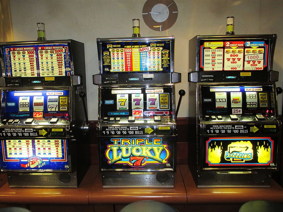 slot machines, gambling, casino, jackpot, indoors, arts culture and entertainment, technology ...