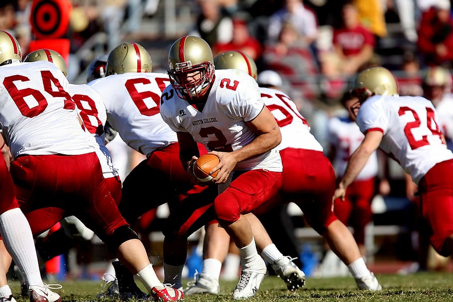 person, playing, football, daytime, quarterback, team, scrimmage, game, play, competition