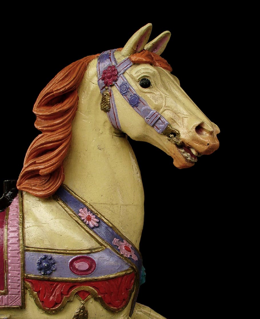close-up photo, brown, multicolored, floral, horse figurine, horse, wooden, carousel, retro, nostalgic