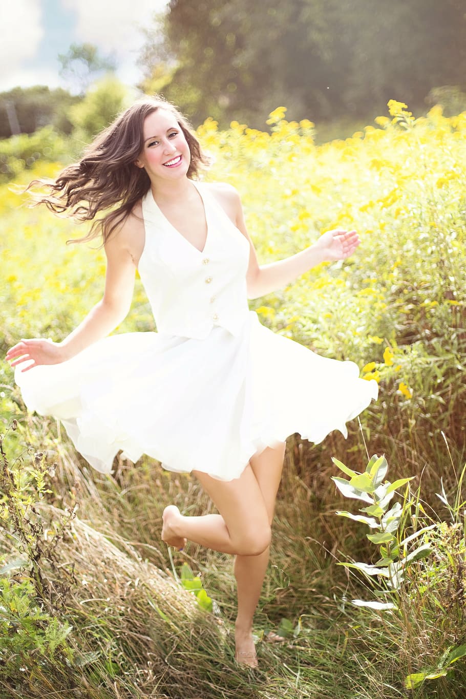 woman, white, halter, top, skirt, surrounded, yellow, flowers, girl, happy