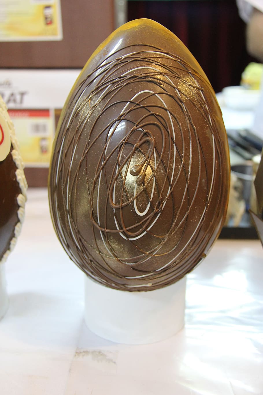 chocolate, egg, easter, focus on foreground, indoors, close-up, table, spiral, still life, metal