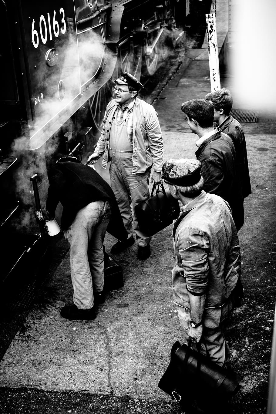 people, men, standing, waiting, train, station, smoke, travel, black and white, group of people