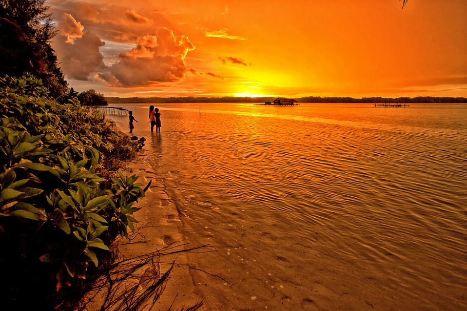children, standing, gray, sand, next, beach, sunset, lagoon, tropical, orange color