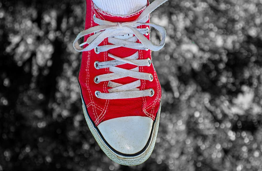 foot, shoe, sneaker, woman shoe, shoe laces, style, fashion, footwear, red, focus on foreground