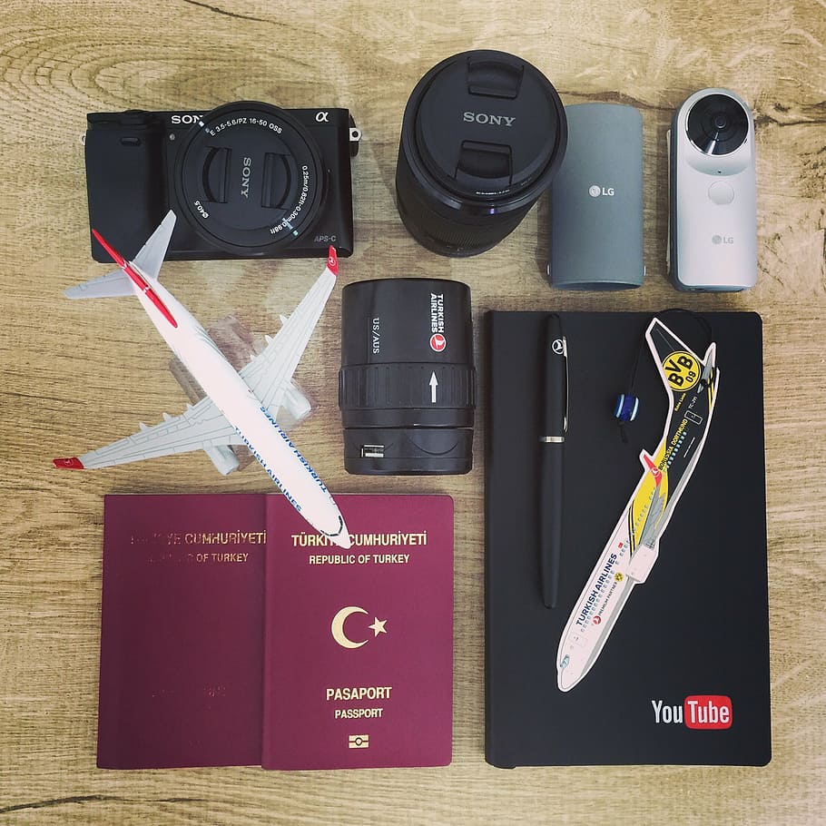 black, sony dslr camera kit, assorted, products, lot, airplane, business, camera, passport, notebook