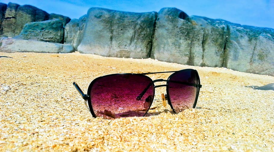 sunglasses, seashore, beach, outdoors, rocks, sand, shore, day, sky, sea
