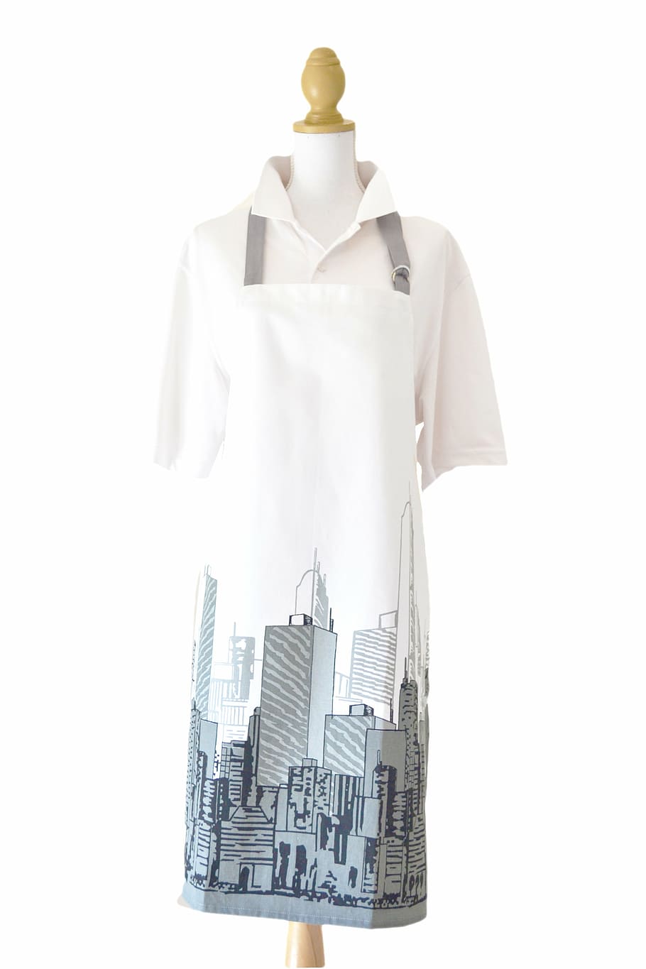 apron, cityscape grey, white, white background, studio shot, human representation, clothing, cut out, mannequin, indoors