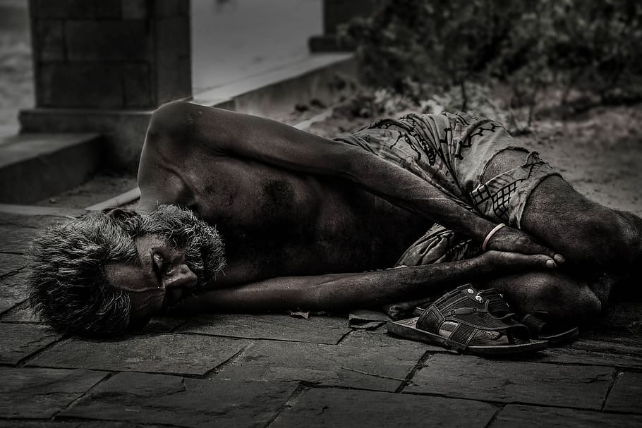 grayscale photo, man, sleeping, floor, grass, people, homeless, male, street, poverty
