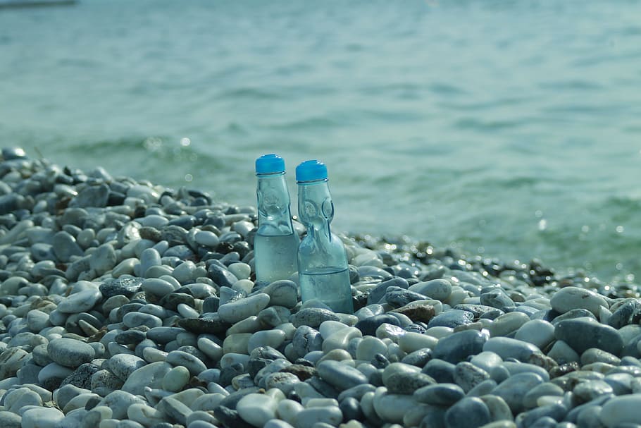 sea, lemon soda, blue, water, nature, rock, pebble, bottle, day, solid