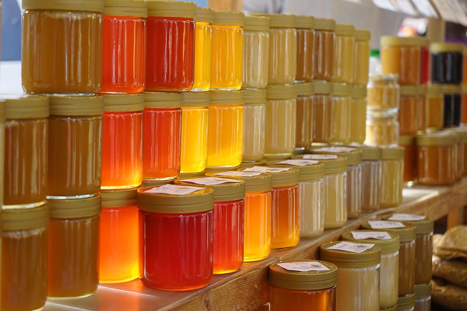 clear, glass jar lot, brown, shelf, honey, honey jars, forest honey, flower honey, back light, honey yellow